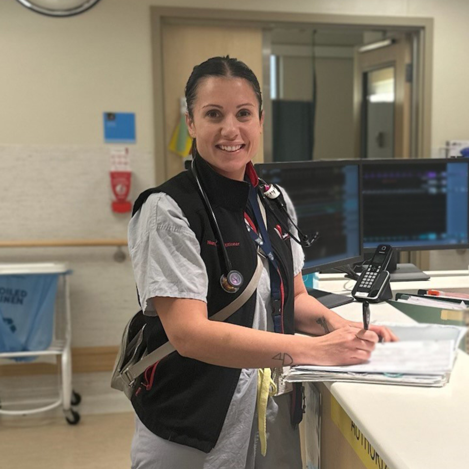 smiling female medical professional looking at the camera