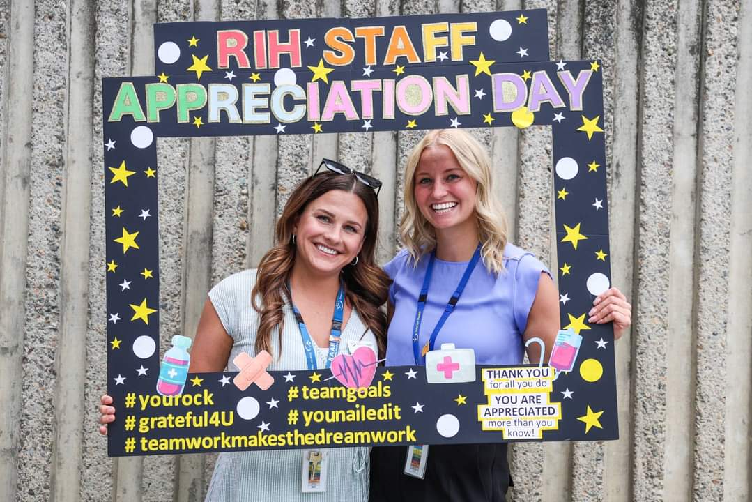 Two smiling woman in a photo frame that says RIH Staff Appreciate Day 