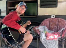 Clint Blok with a guitar.