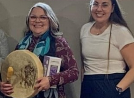 Two women posing for a photo.