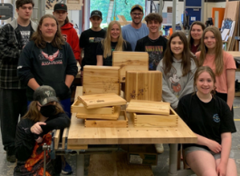 Students display wooden keepsake boxes