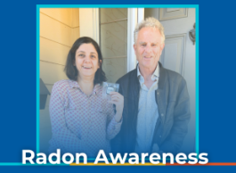 brunette woman and grey hair man smile and hold up small radon testing device